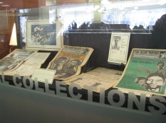 Exhibit case with Black Panther newspapers