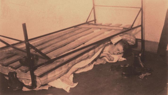 In the middle of any given night, a new student was likely to be “dumped” from his bed, a favorite practical joke inflicted by upperclassmen. This scene, probably staged, was photographed in 1899. 